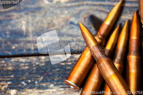 Image of Still life with five rifle cartridges