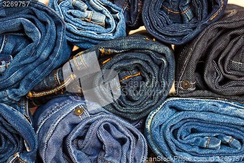 Image of jeans trousers stack