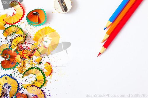 Image of Colored pencil, shavings and sharpener