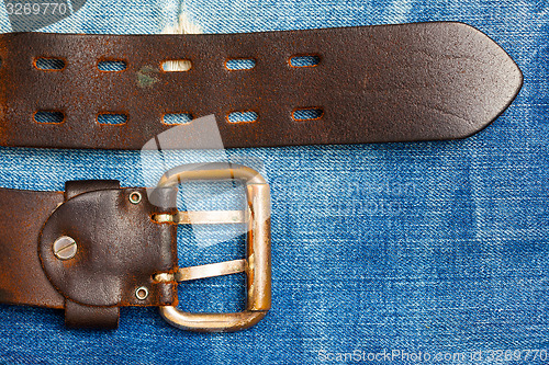 Image of Old leather belt with a buckle