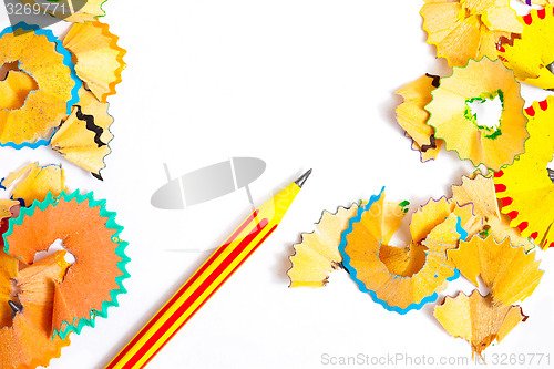 Image of striped pencil and colored shavings