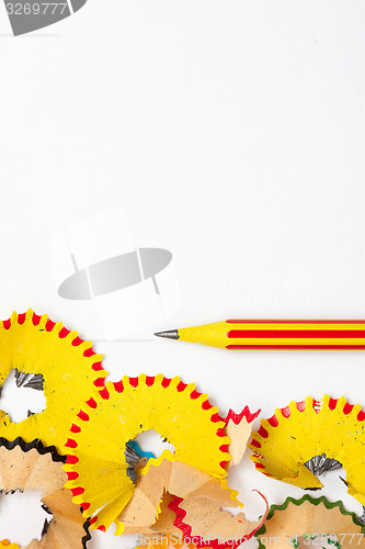 Image of colored striped pencil and shavings