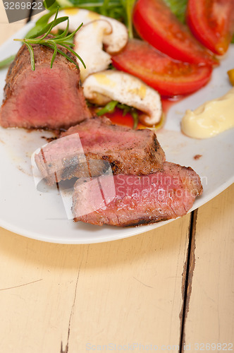 Image of beef filet mignon grilled with vegetables