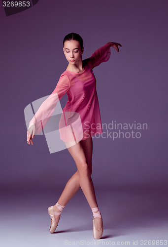 Image of Young ballerina dancer showing her techniques