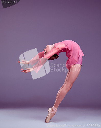 Image of Young ballerina dancer showing her techniques