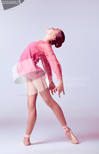 Image of Young ballerina dancer showing her techniques