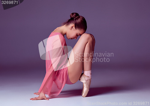 Image of Young ballerina dancer showing her techniques