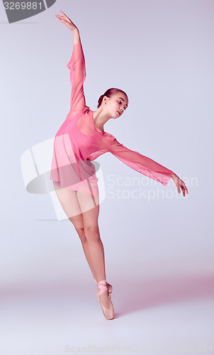 Image of Young ballerina dancer showing her techniques