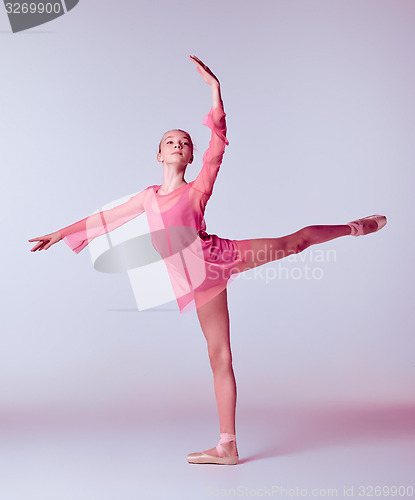 Image of Young ballerina dancer showing her techniques