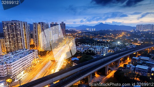 Image of hong kong urban downtown and high speed train at night