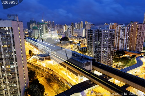 Image of hong kong urban downtown and high speed train at night