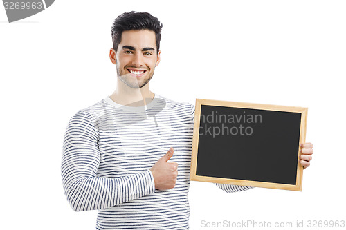 Image of Man holding a chalkboard