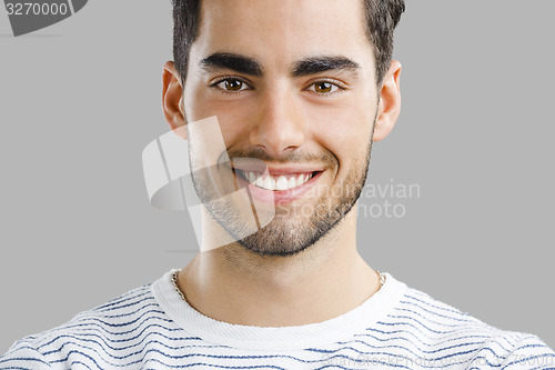 Image of Handsome young man smiling