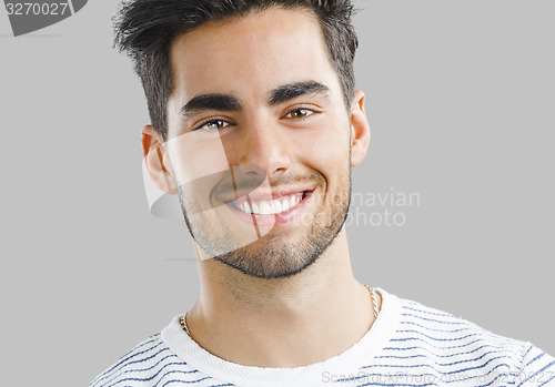 Image of Handsome young man smiling