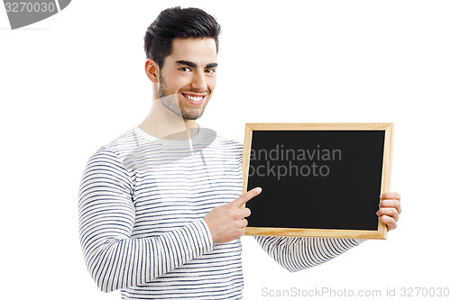 Image of Man holding a chalkboard