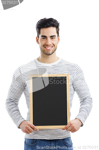 Image of Man holding a chalkboard