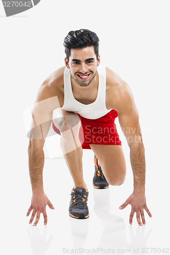 Image of Athletic man ready to run