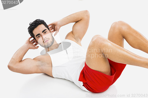 Image of Athletic man doing ABS