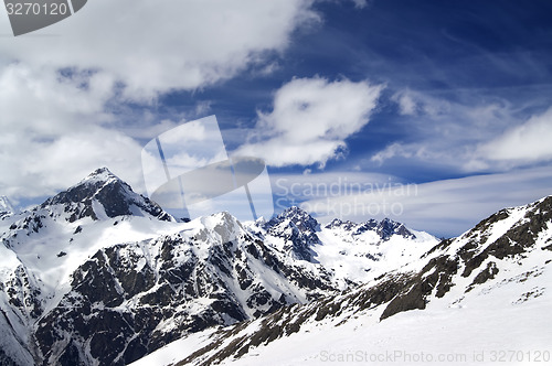 Image of Snowy mountains in wind day