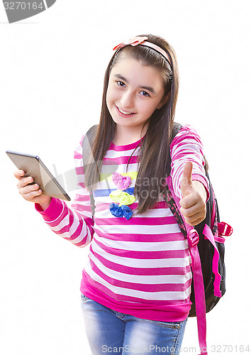Image of Beautiful teenager girl with backpack and digital tablet