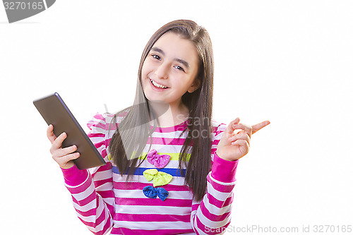 Image of Beautiful teenager girl with backpack and digital tablet