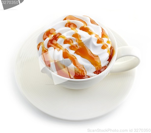 Image of caramel latte coffee with whipped cream