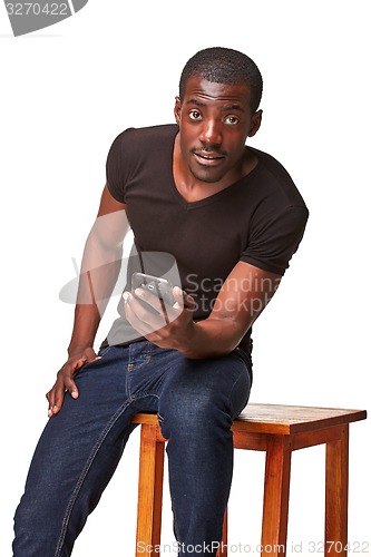 Image of Portrait of african man talking on the phone