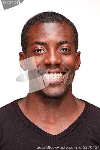 Image of portrait of handsome young black african smiling man