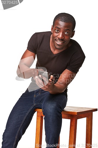 Image of Portrait of african man talking on the phone
