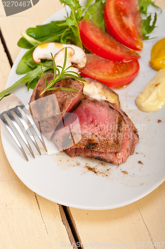 Image of beef filet mignon grilled with vegetables