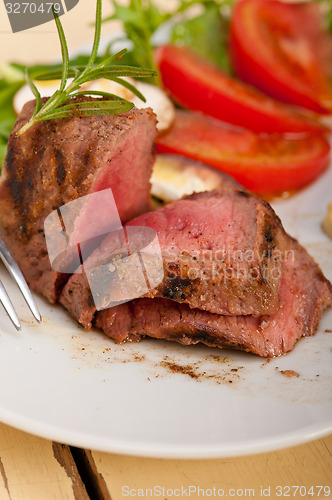 Image of beef filet mignon grilled with vegetables