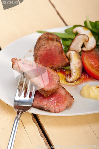 Image of beef filet mignon grilled with vegetables