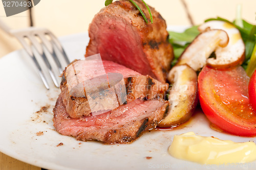 Image of beef filet mignon grilled with vegetables