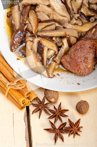 Image of venison deer game filet and wild mushrooms