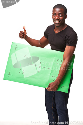 Image of The smiling african man as black businessman with green panel