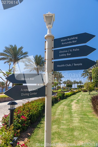 Image of signboard on the beach at hotel, Egypt