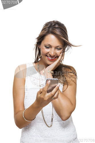 Image of Vivacious woman reacting to a text message