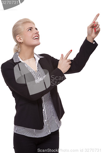 Image of Businesswoman Pointing Up While Looking at Camera