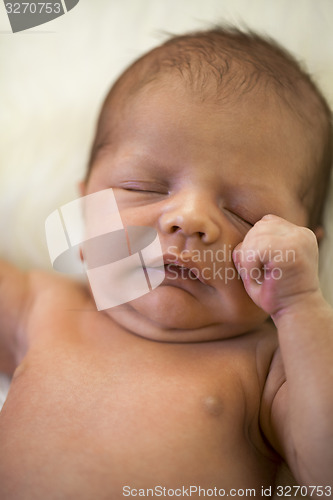 Image of Cute New Born Baby Lying on White Cloth