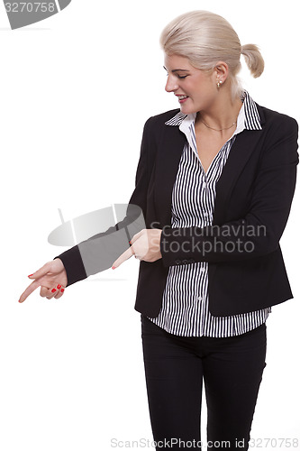 Image of Businesswoman Pointing Up While Looking at Camera