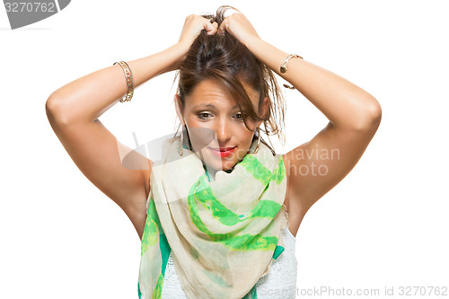 Image of Laughing Pretty Woman Holding Back her Hair