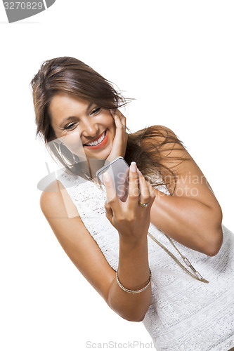 Image of Vivacious woman reacting to a text message