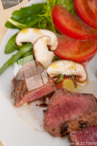 Image of beef filet mignon grilled with vegetables