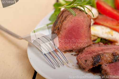 Image of beef filet mignon grilled with vegetables