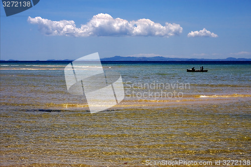 Image of boat near the coastline