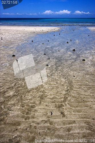 Image of little rock in andilana beach