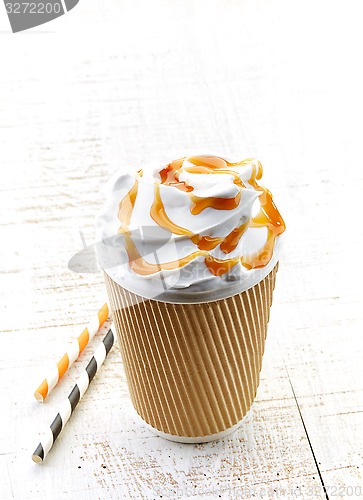 Image of caramel latte coffee with whipped cream