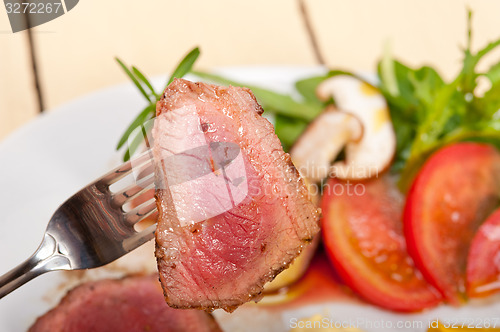 Image of beef filet mignon grilled with vegetables