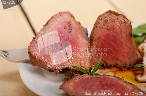 Image of beef filet mignon grilled with vegetables