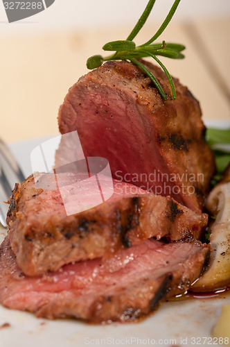 Image of beef filet mignon grilled with vegetables